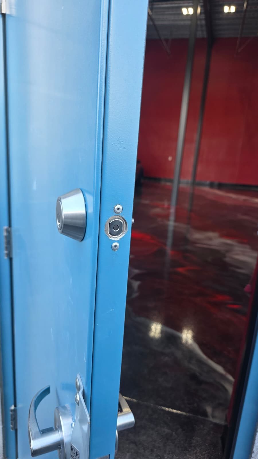 Commercial panic-bar exit device installed by Armor Lock & Safe — fire-code compliant Vegas installation