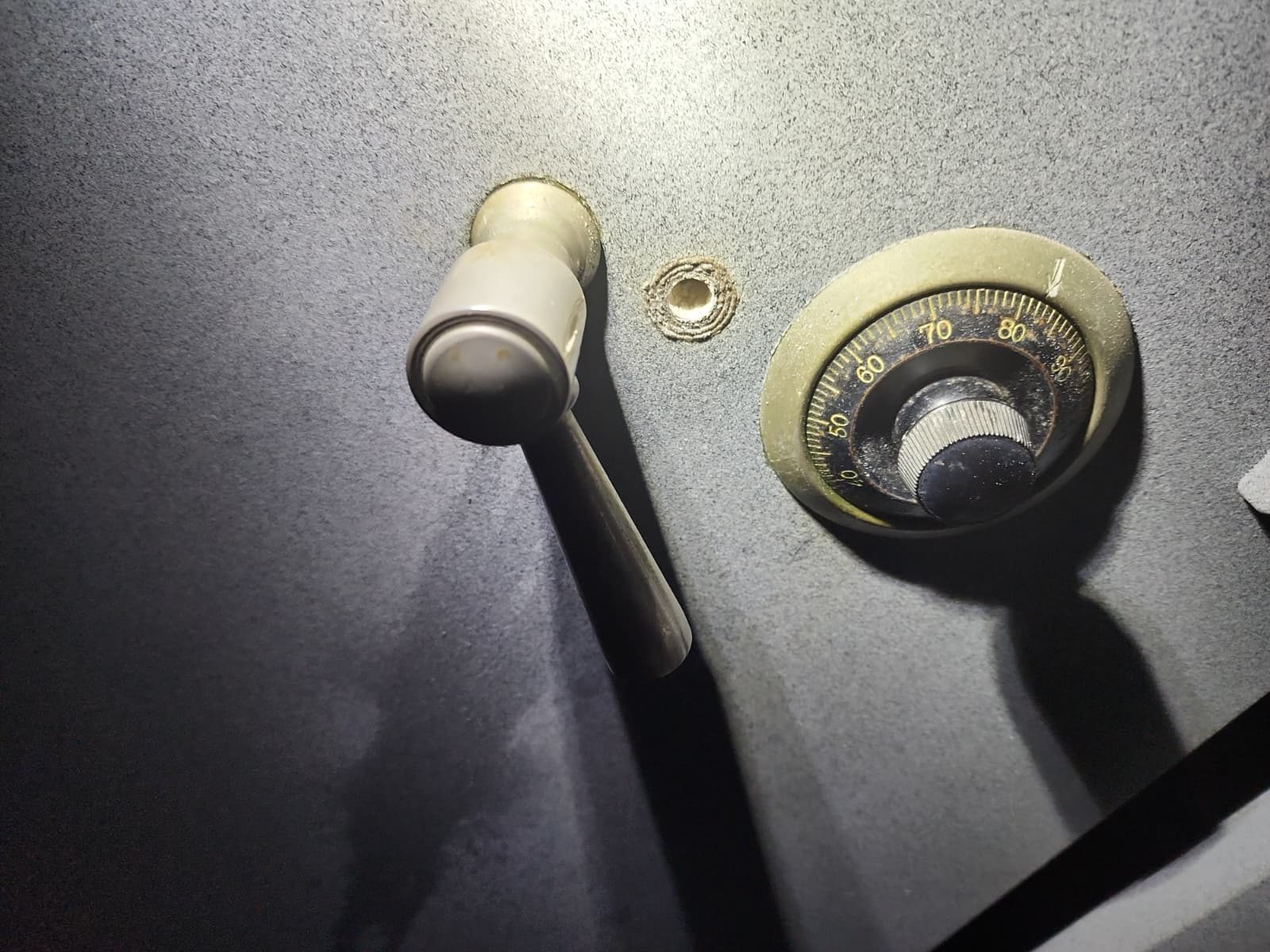 Mechanical Group-2 dial close-up on Armor Lock & Safe job site — the surface where manipulation reads wheel-pack contact points